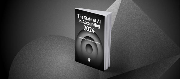 An angled view of Karbon Magazine's 'The State of AI in Accounting 2024' report placed against a textured grey background, emphasizing its comprehensive analysis on AI's role in accounting.