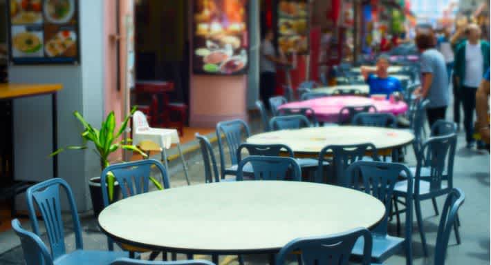 Table outside cheap restaurant in Singapore