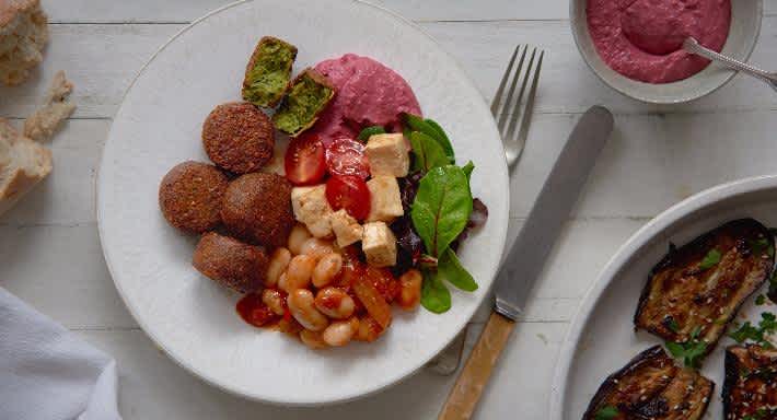 Healthy plate of vegan and vegetarian food at Tibets in Mayfair London