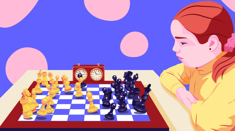 Una niña jugando al ajedrez sola
