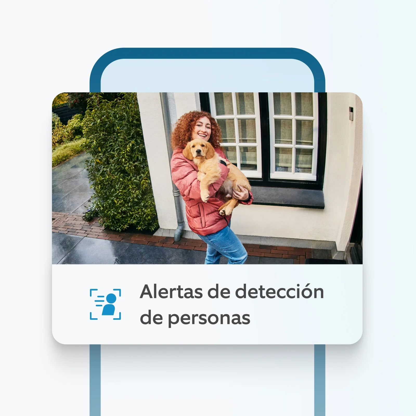 Cámara Ring detecta a una mujer con chaqueta roja sosteniendo un cachorro en el porche, con alerta de Persona Detectada.