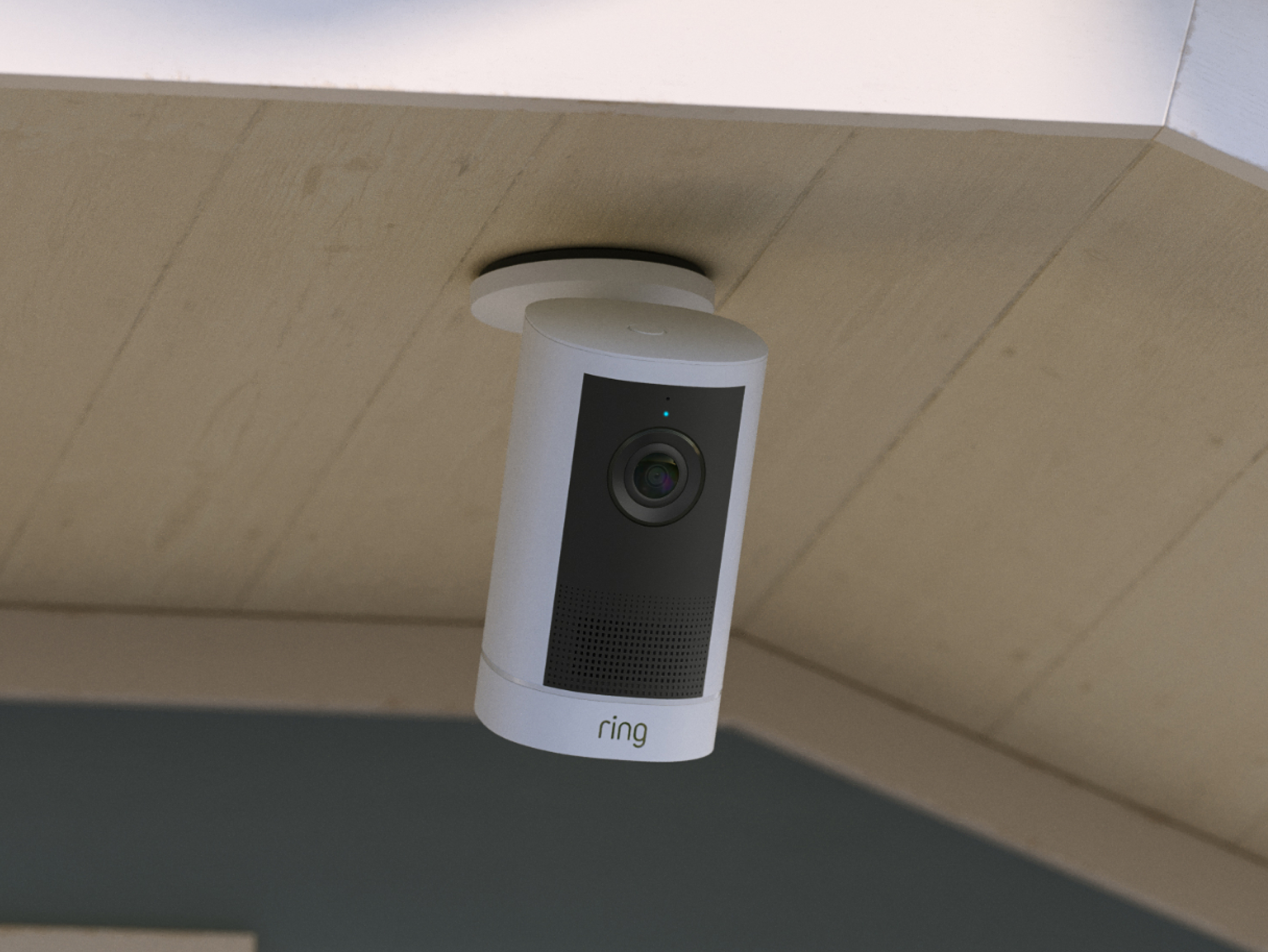 White Outdoor Camera 4K Plus is mounted on a rooftop.