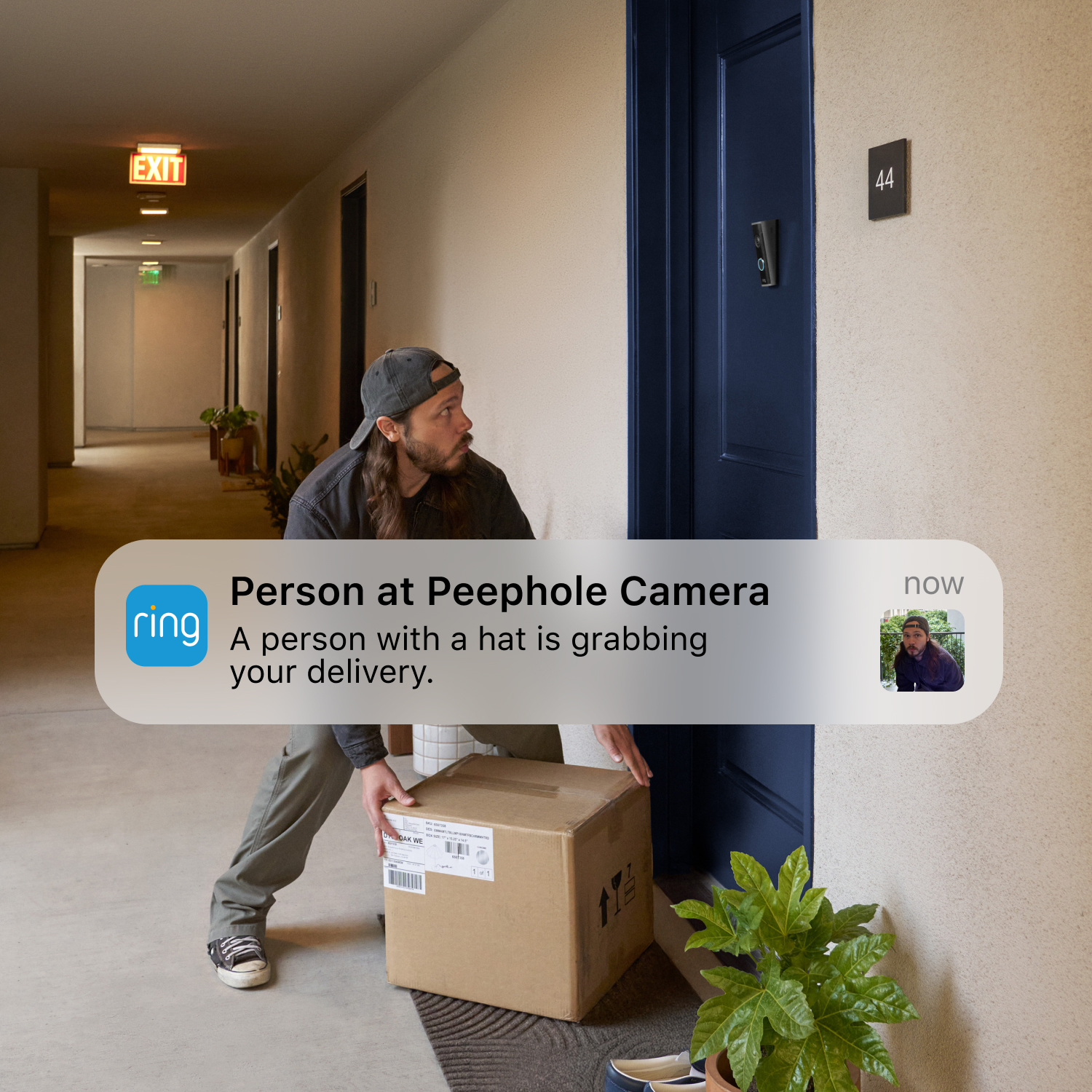 Peephole Camera 2K (60-90 mm) - A man crouching to grab a delivery box from a doormat, glancing up at a Peephole Camera, with an app alert: 