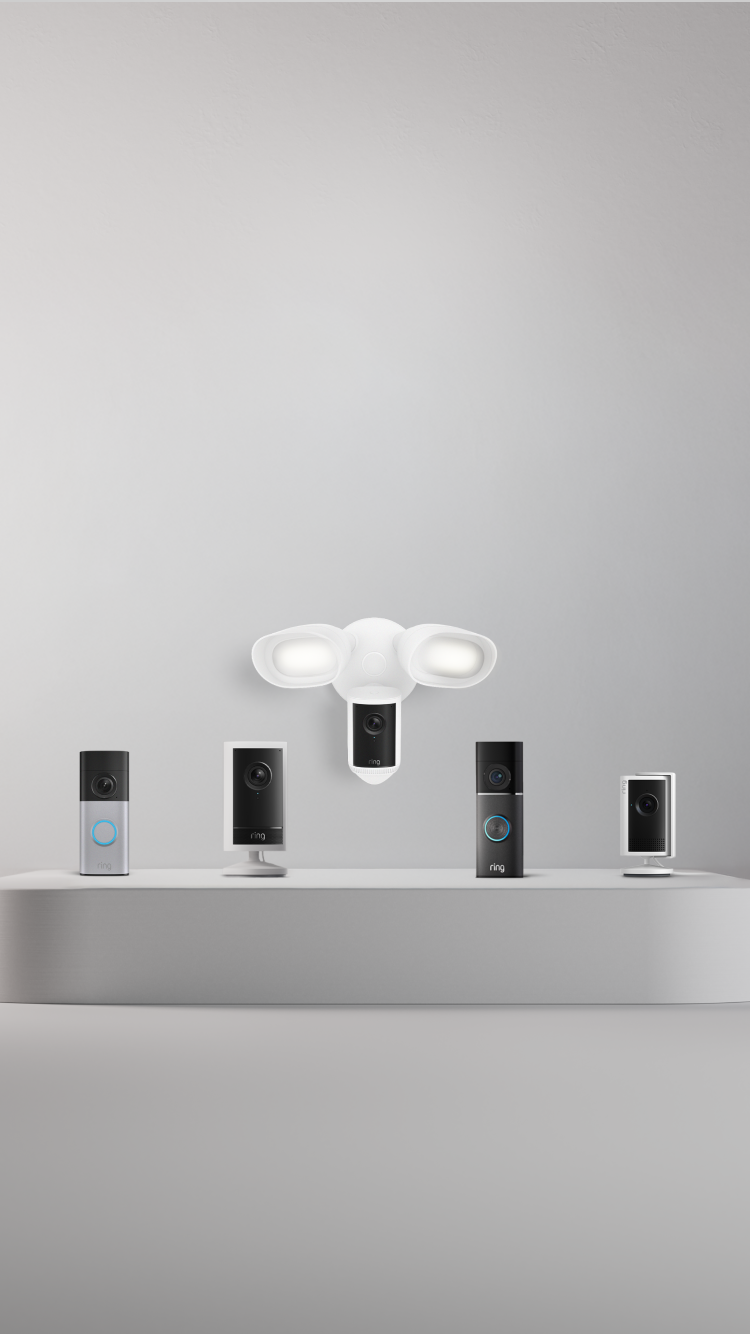 A display of Ring security cameras and video doorbells depict Outdoor Camera Pro as well as Wired Video Doorbell Pro (3rd Gen), Wired Video Doorbell Plus, Floodlight Cam Pro (2nd Gen) and Indoor Camera Plus.