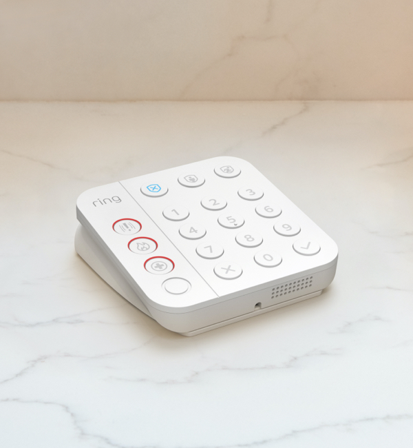 Ring Alarm Keypad on marble surface with 24-hour backup battery for power outage protection.