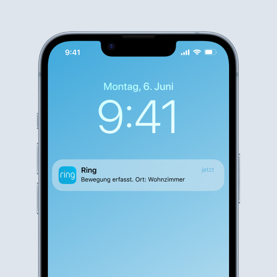 Smartphone-Bildschirm zeigt Ring App-Benachrichtigung über Bewegungserkennung im Wohnzimmer am Dienstag, 6. Juni um 2:55.