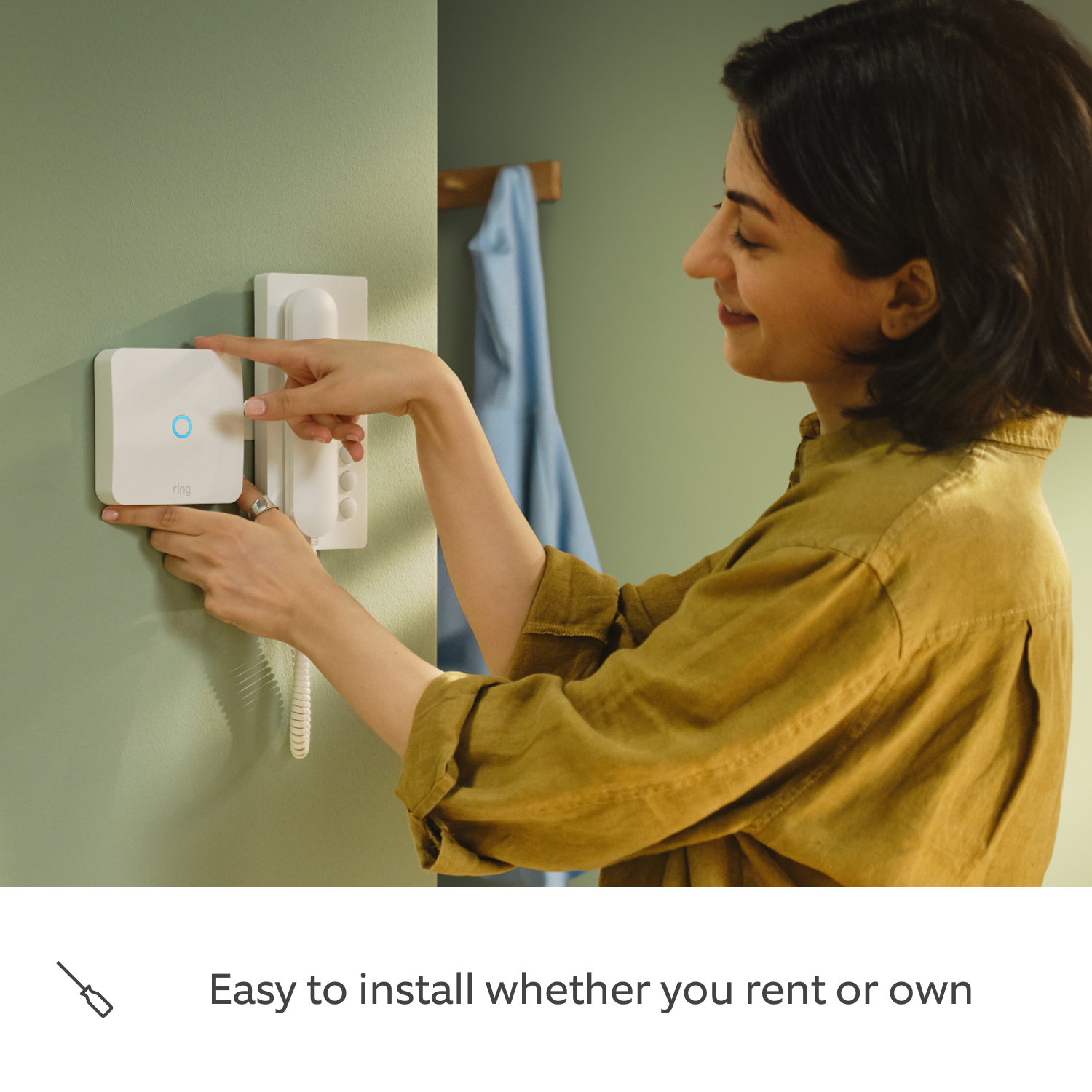 Ring Intercom Audio - A girl installing a Ring Intercom Audio.