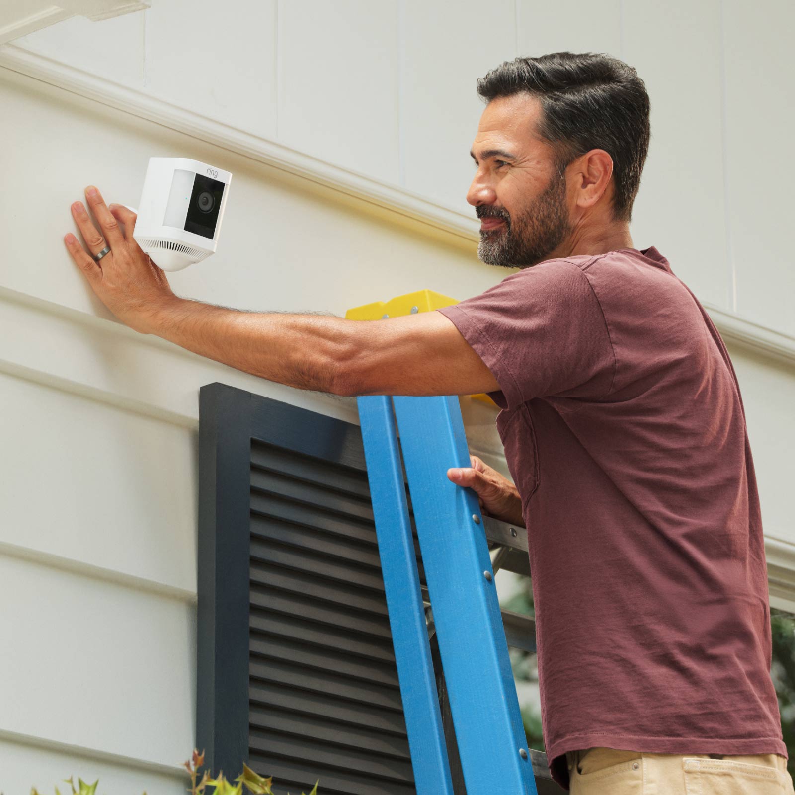 A an installating a Ring Camera on a wall with PoE+ Converter Mount.