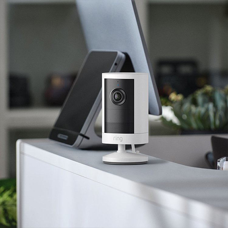 Outdoor Camera (2nd Gen) is freestanding on a mantle in an office setting
