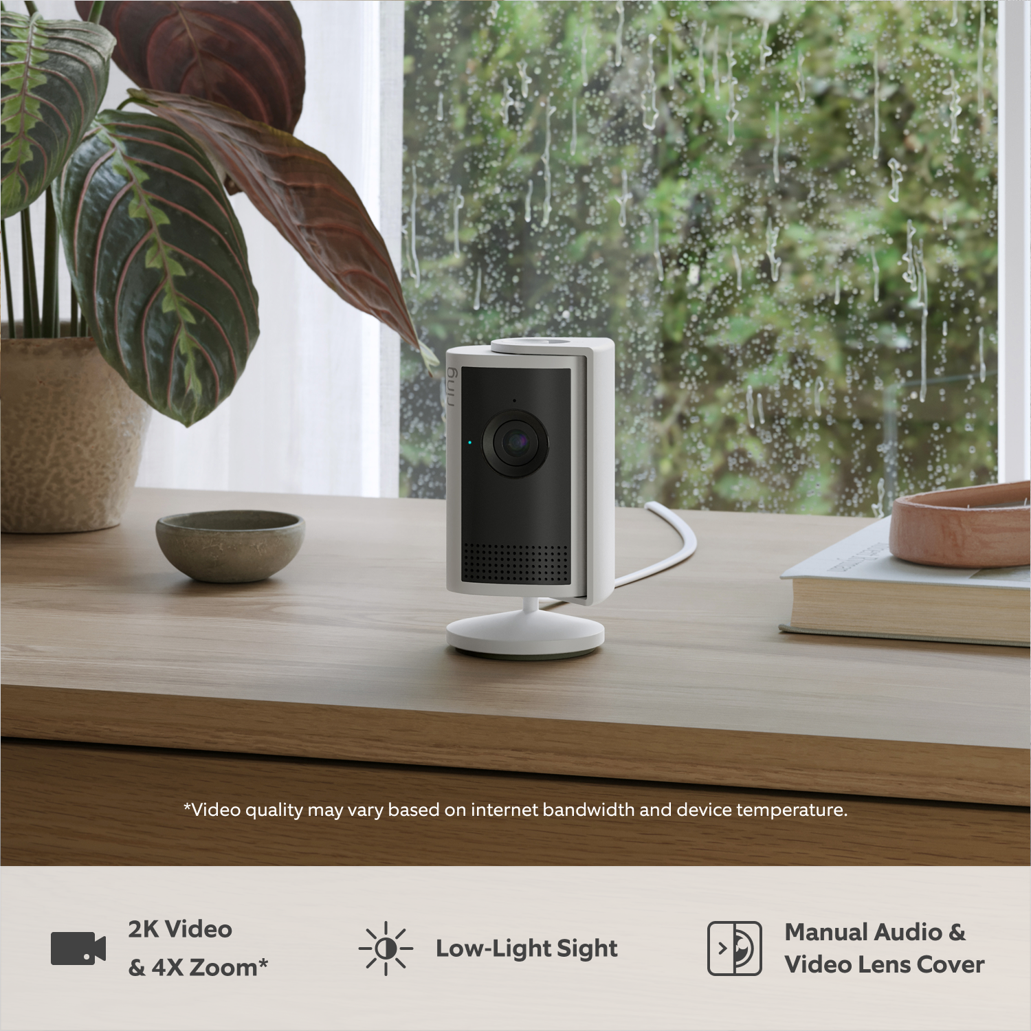 Indoor Camera Plus (for Featuring Retinal 2K) - A white Indoor Cam Plus is positioned on a sideboard, in front of a window. Text panel below highlights key features