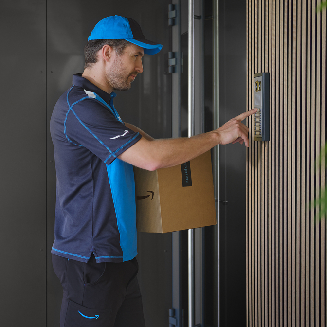 A jogger listening to an audio call from a Ring Intercom
