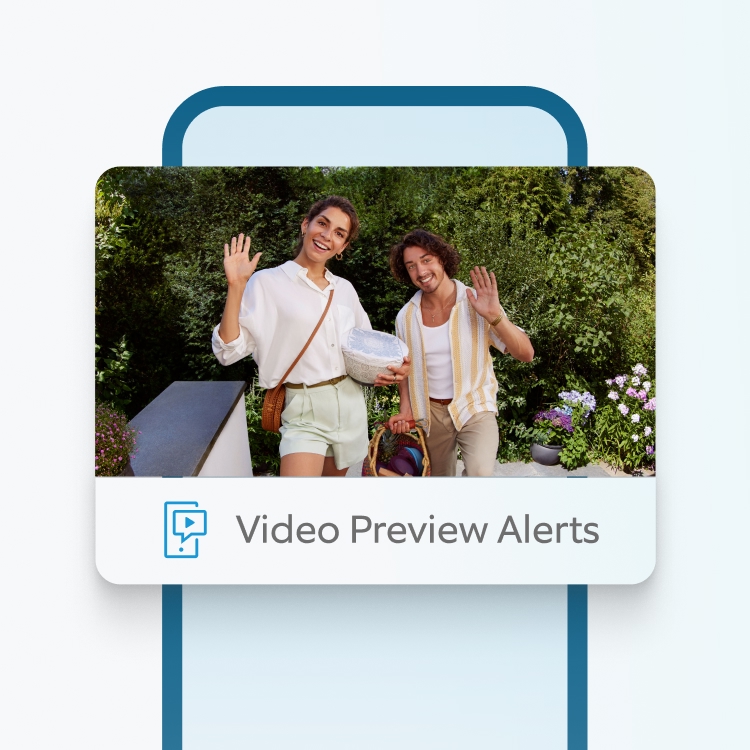 Two visitors waving at the door, representing a Ring video alert preview captured by a security camera.