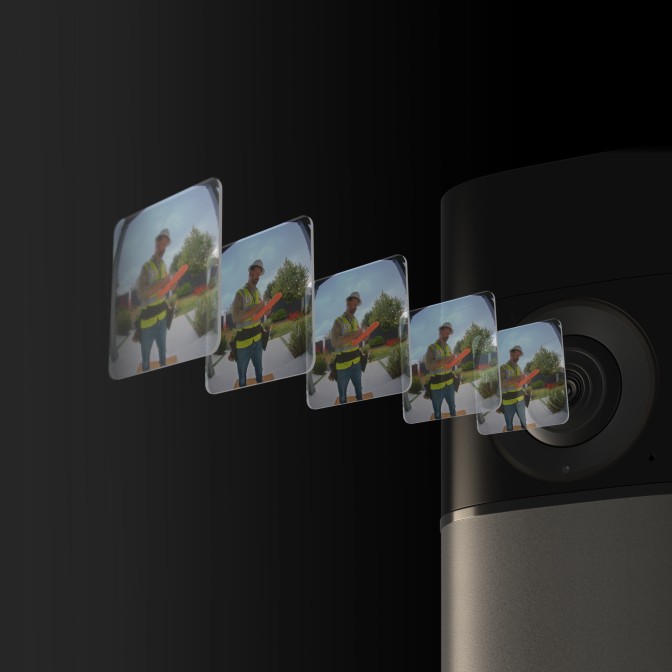 A close-up of a Ring camera lens highlighting the complexity of the technology inside.