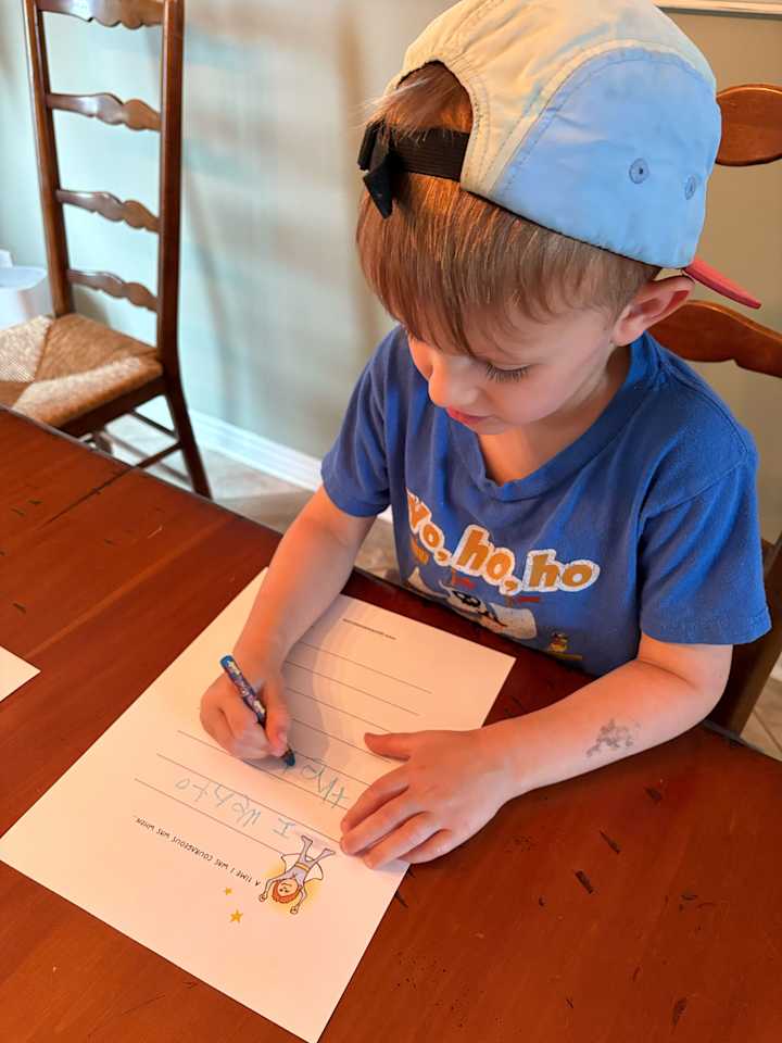 Ollie writing down his courage
