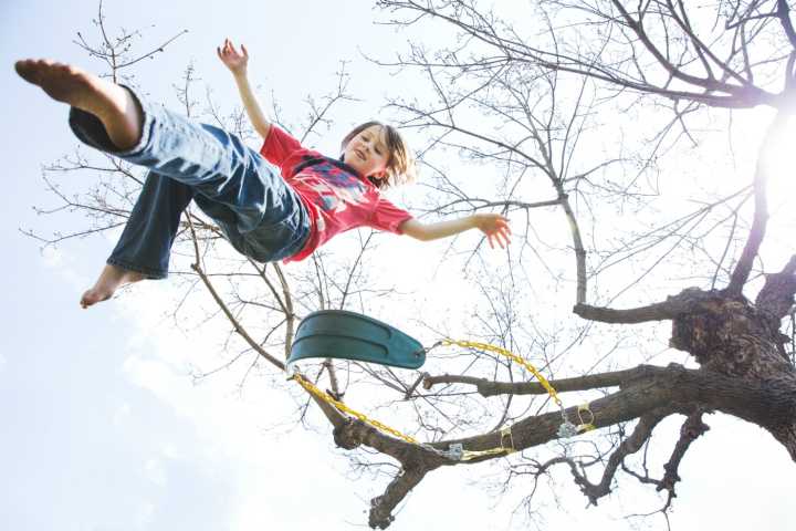 Child Jumping off Swing 1400