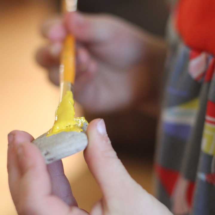 Painting-One-side-of-each-stone-for-the-dominos-game-set