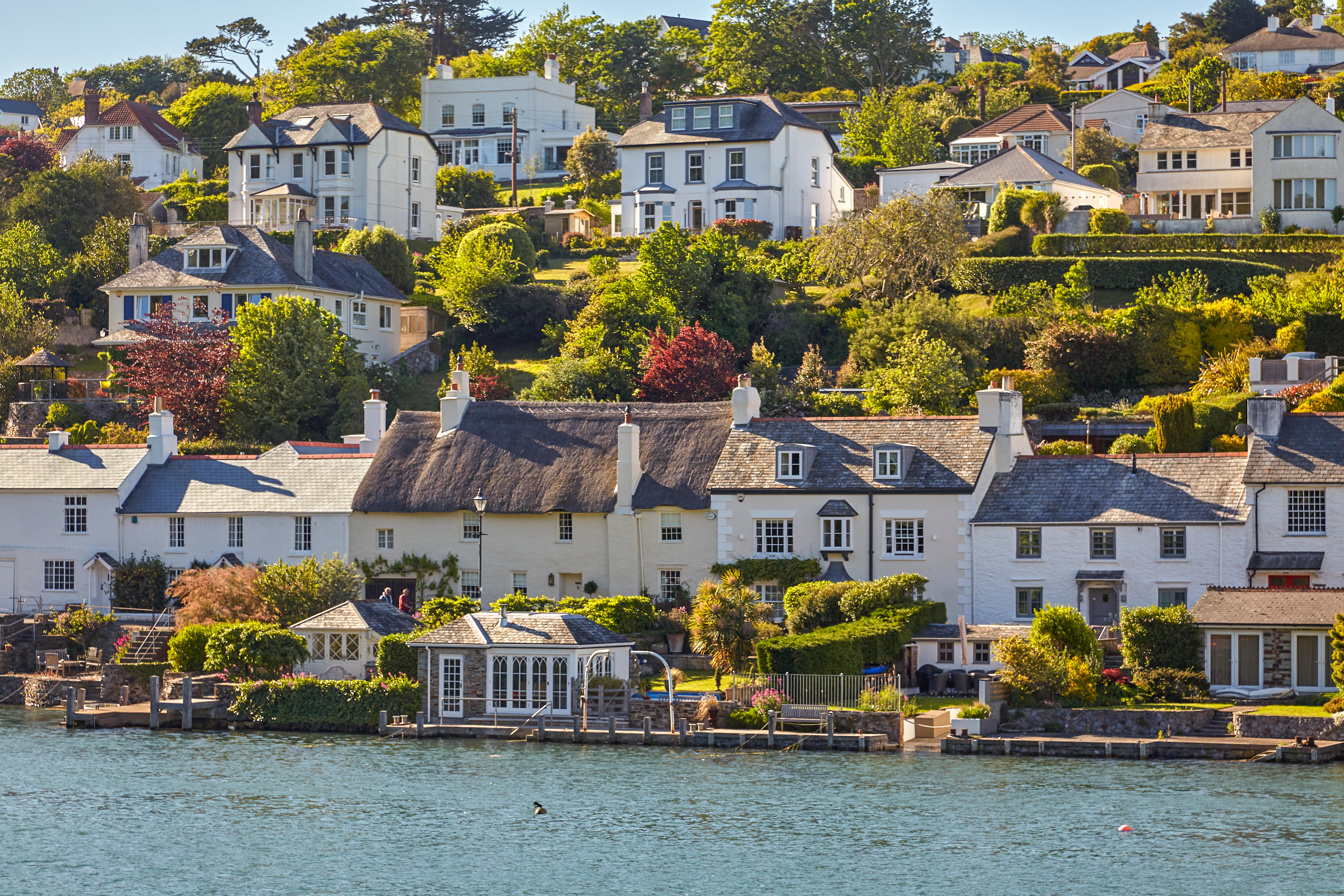Collection of coastal homes overlooking the water