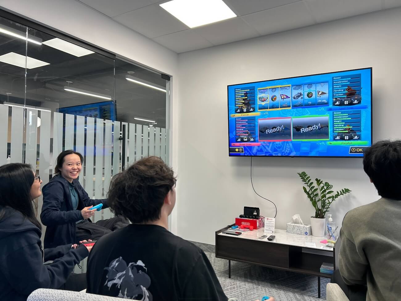 A group of 1Password interns playing Mario Kart together.