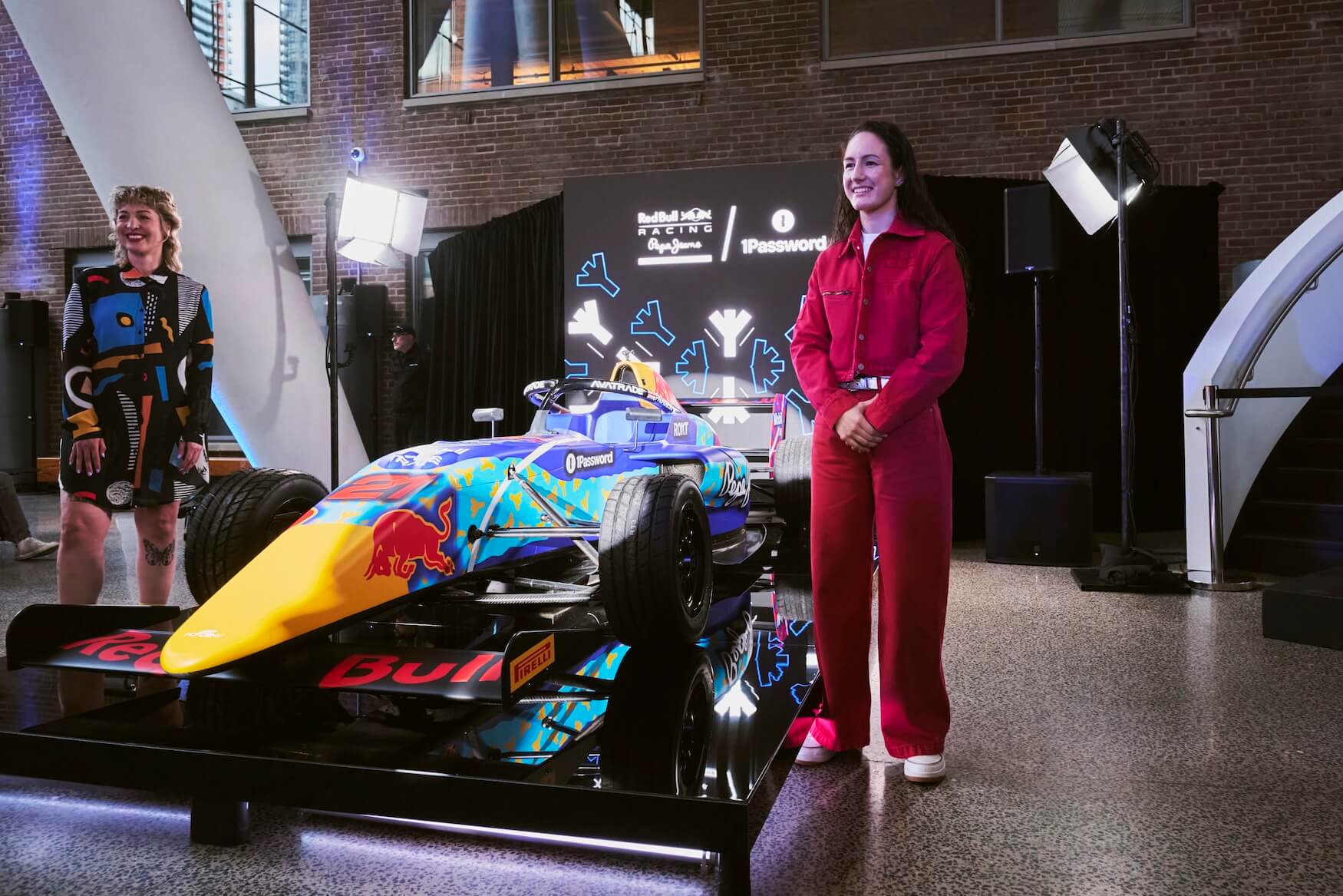 A photo of Alisha Palmowski and Kirsten McCrea after unveiling the livery design.