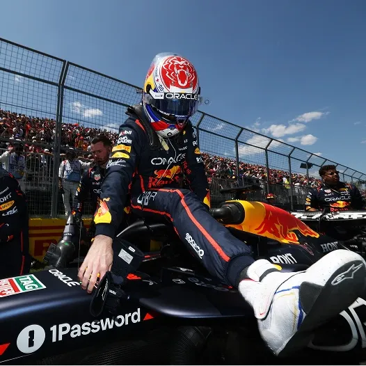 Oracle Red Bull Racing driver enters their car to start a race.