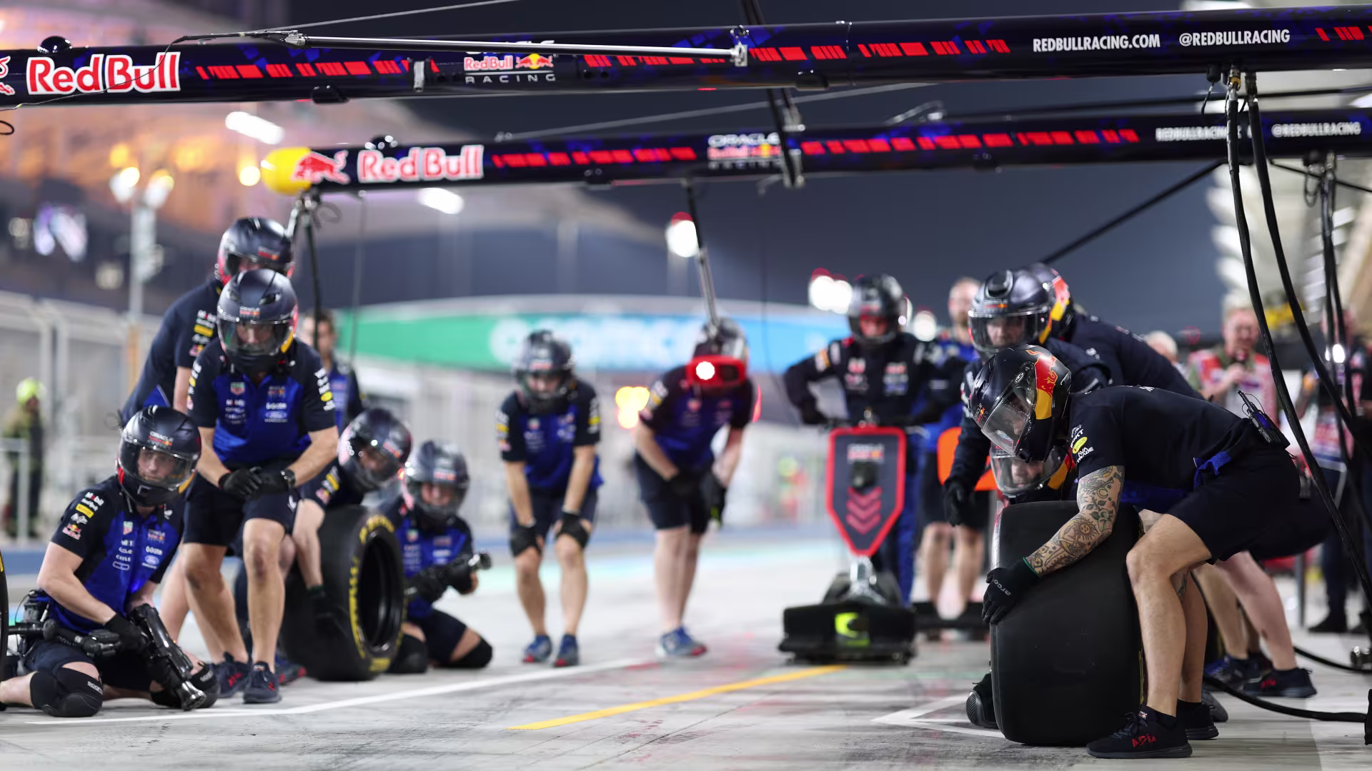The Oracle Red Bull Racing pit crew revs into action, from "Your digital pit crew: a 10-minute pre-race security checklist" by 1Password.