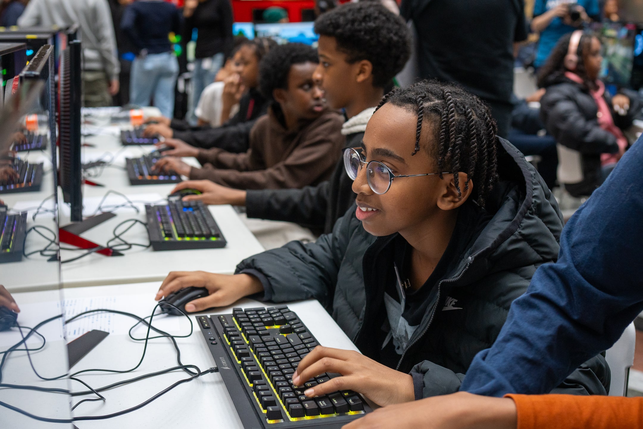 Students working on desktop computers.