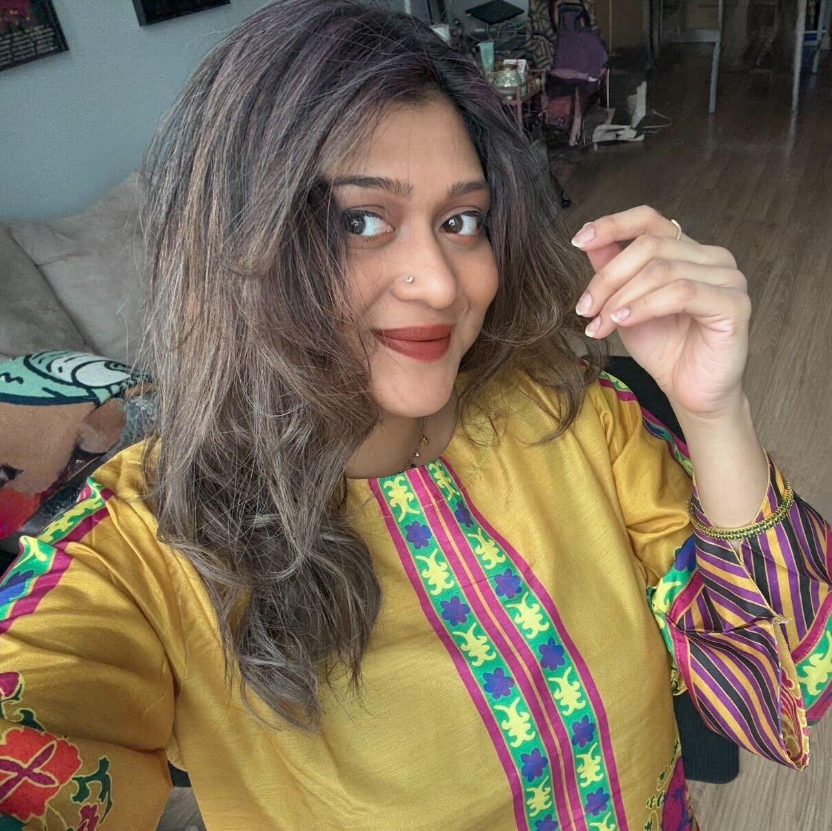 A picture of Kaynat Chowdhury, Customer Success Manager and Communications Lead for 1Password's SWANA Employee Community Group