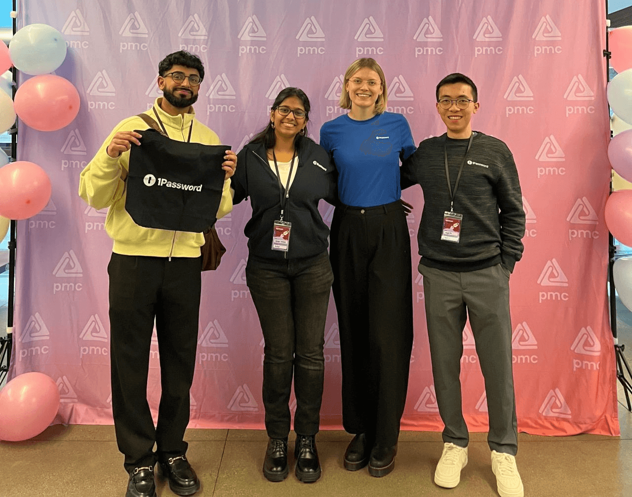 1Password employees at booth.