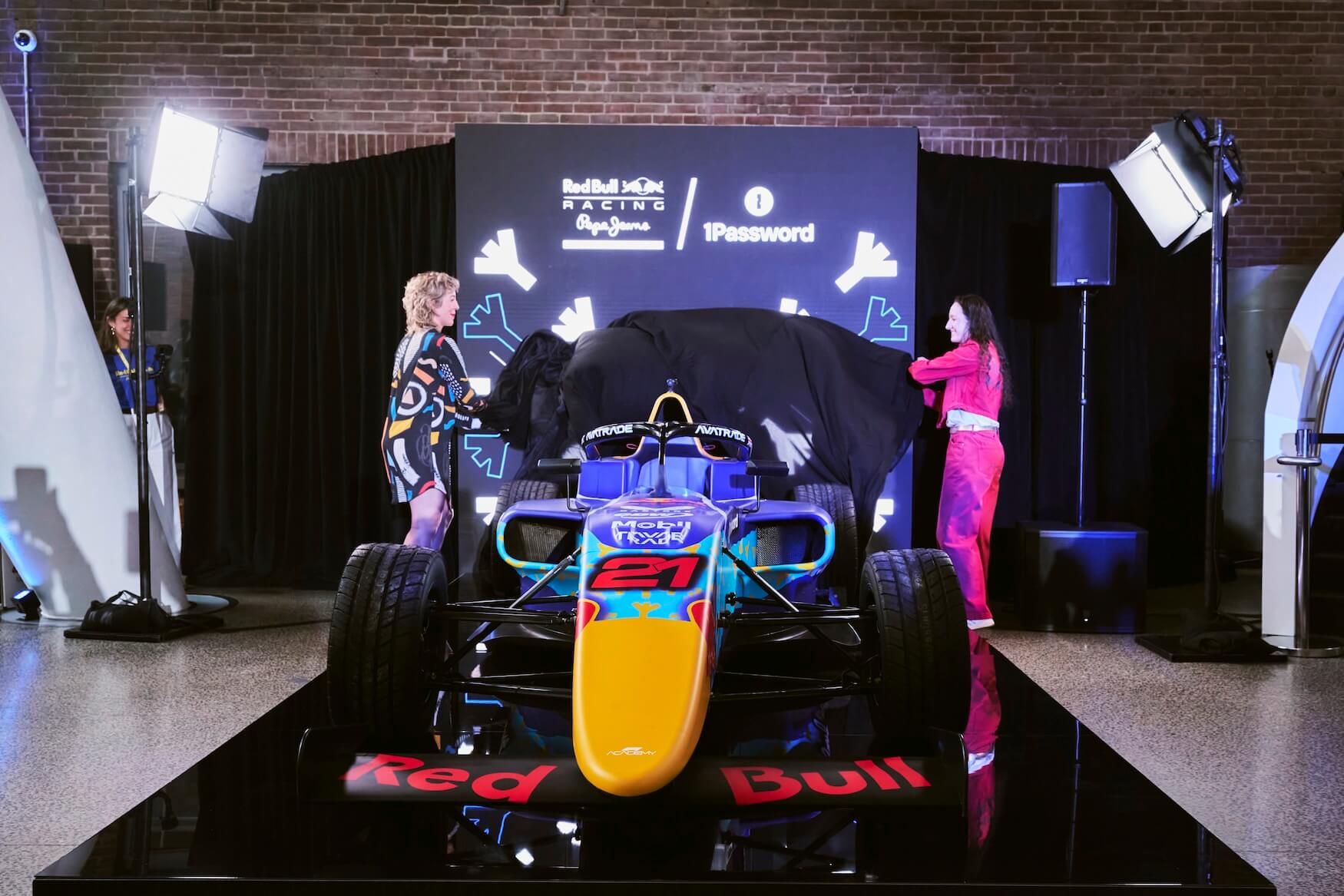 A photo of Alisha Palmowski and Kirsten McCrea unveiling the livery design.