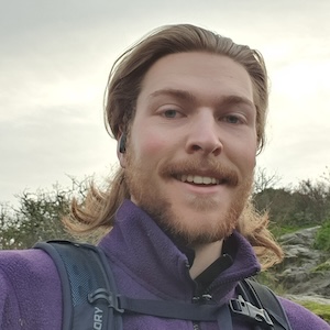 A headshot of Max Thomson, a Developer Intern at 1Password