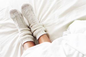 Zes tips tegen koude voeten in bed
