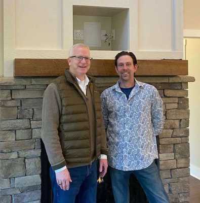 Sundog Homes President David Earley and Construction Manager Brent Raynor perform a quality inspection of the Geiger home.