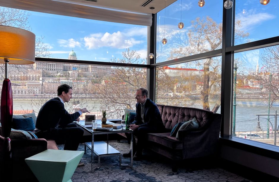 My interview with Professor Barry Bergdoll at the InterContinental Budapest, with the Castle Hill in the background. Photo: Regina Papp for Offbeat