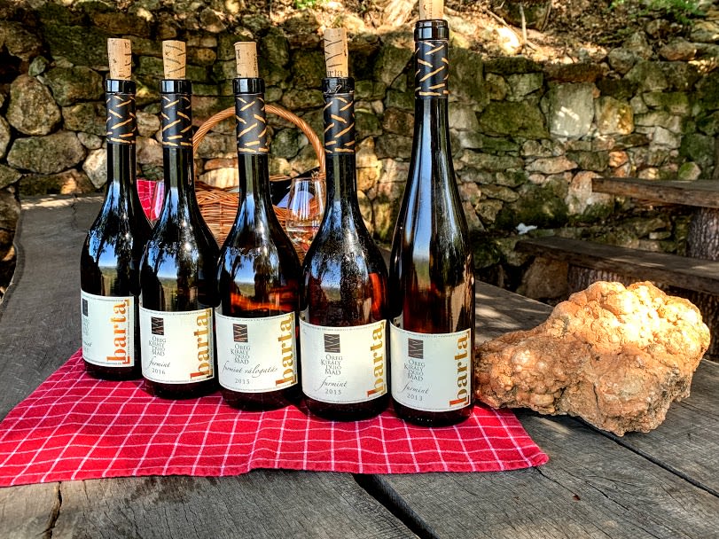 Bottles of Barta wines shown with the soil they come from. Photo: Tas Tóbiás