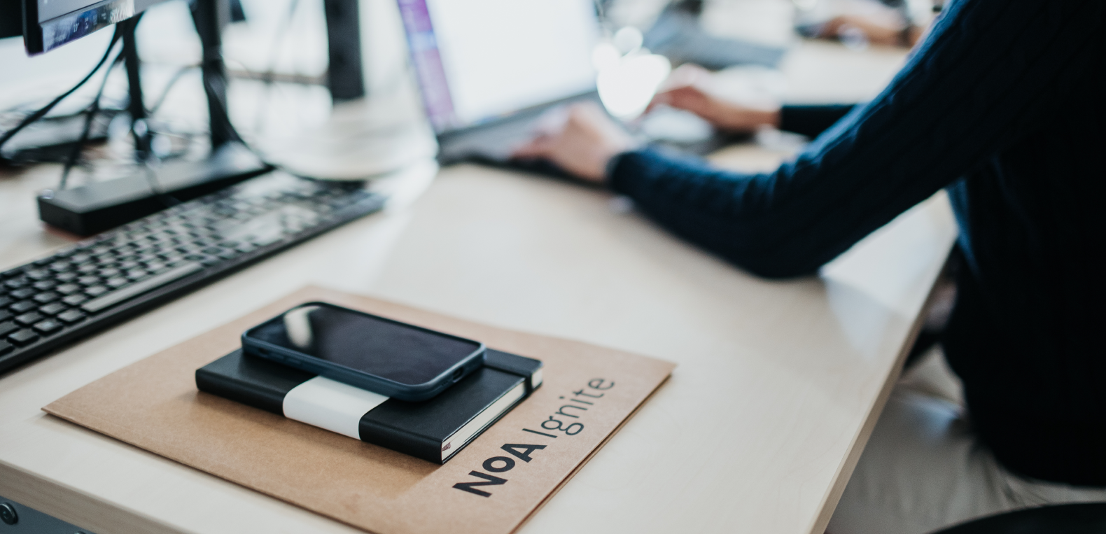 File, calendar and phone laying on the table