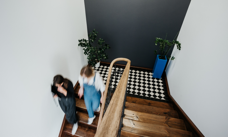 People walking down the stairs