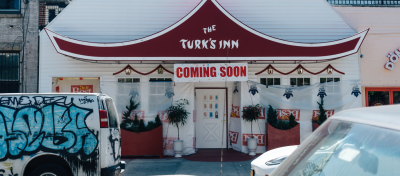 The Turk's Inn entrance with a Coming soon sign.