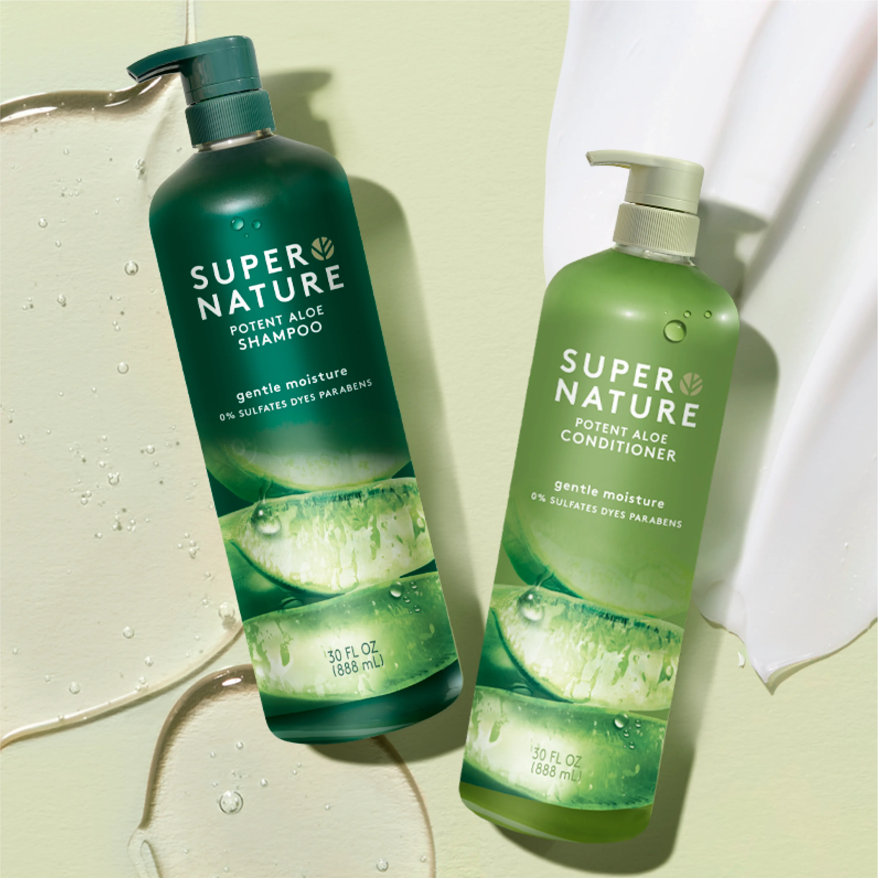Super Nature Shampoo and Conditioner laying flat over a shampoo and conditioner formula 
