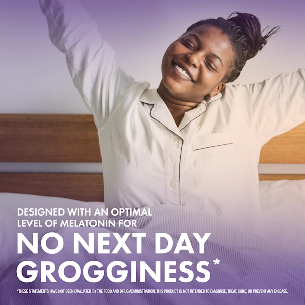 Person stretching in bed wearing pajamas with text stating "Designed with optimal level of melatonin for No next day grogginess".