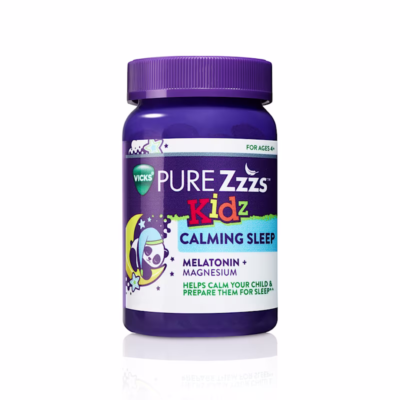Purple bottle of PURE Zzzs Kidz Calming Sleep Melatonin + Magnesium gummies.