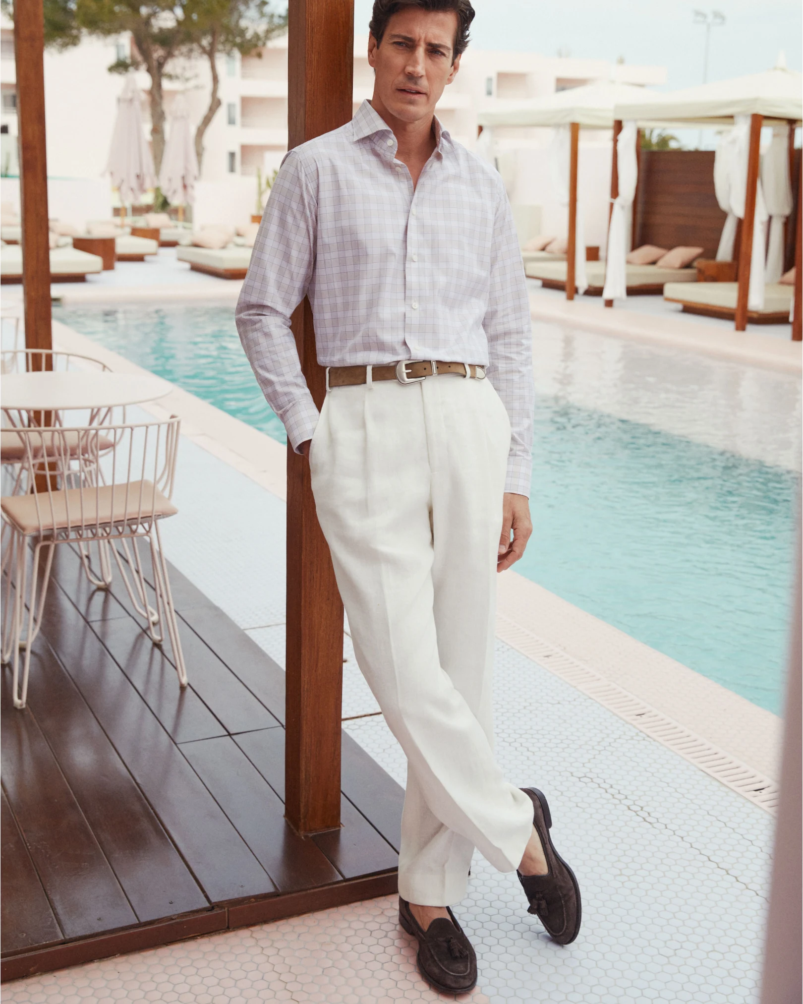 model at pool in shirt