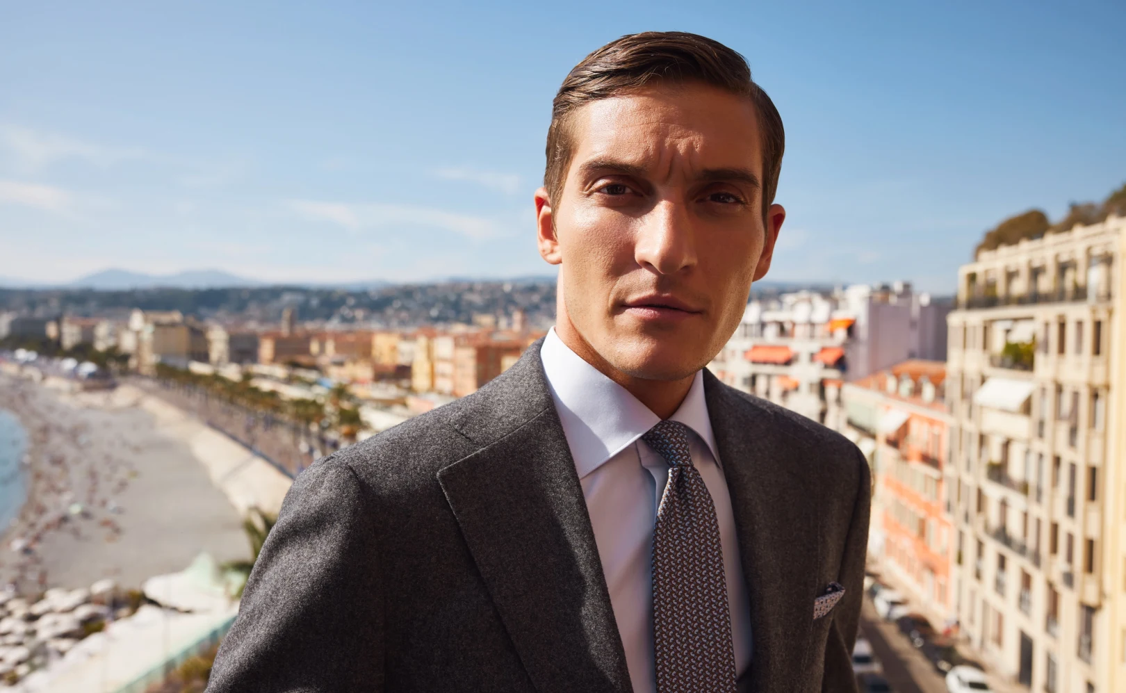 model in suit shirt and tie