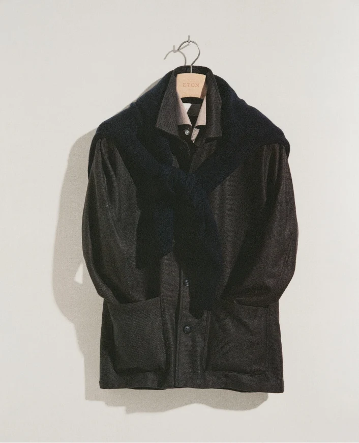 an outfit ensamble hanging on a hanger