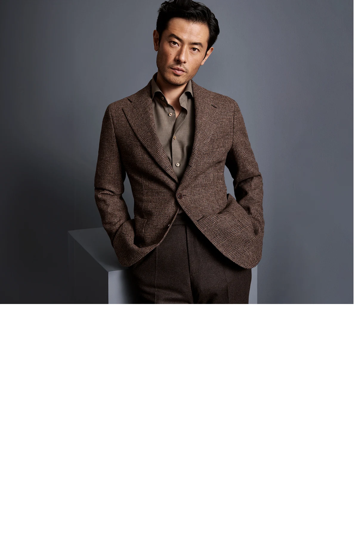 model wearing brown suit and shirt