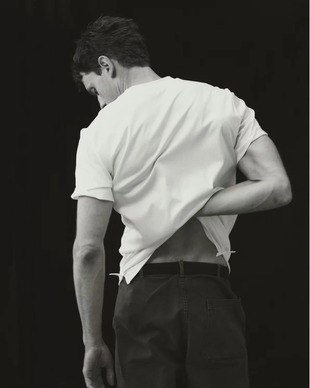 model posing in a white filo di scozia t-shirt