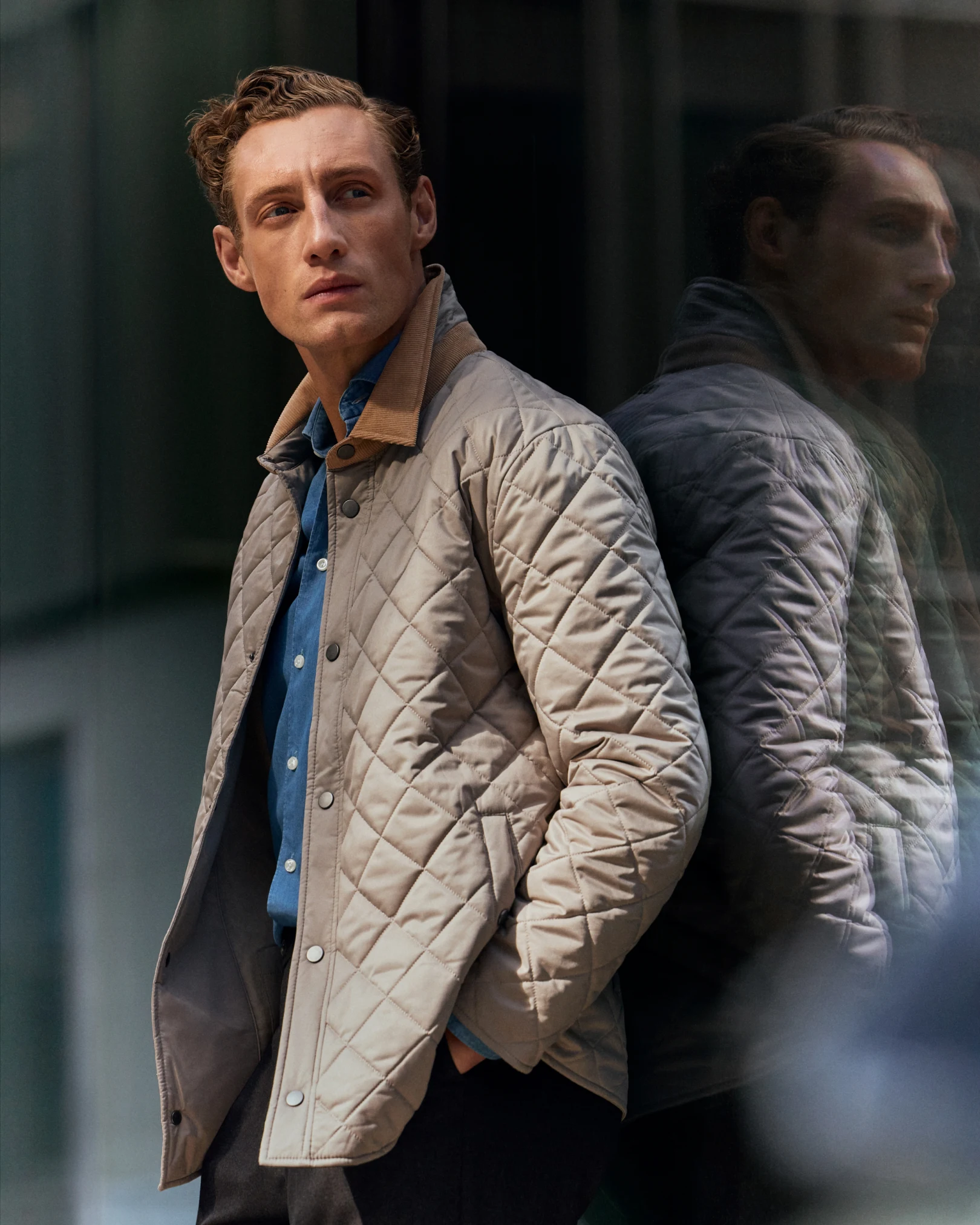 quilted jacket and denim shirt
