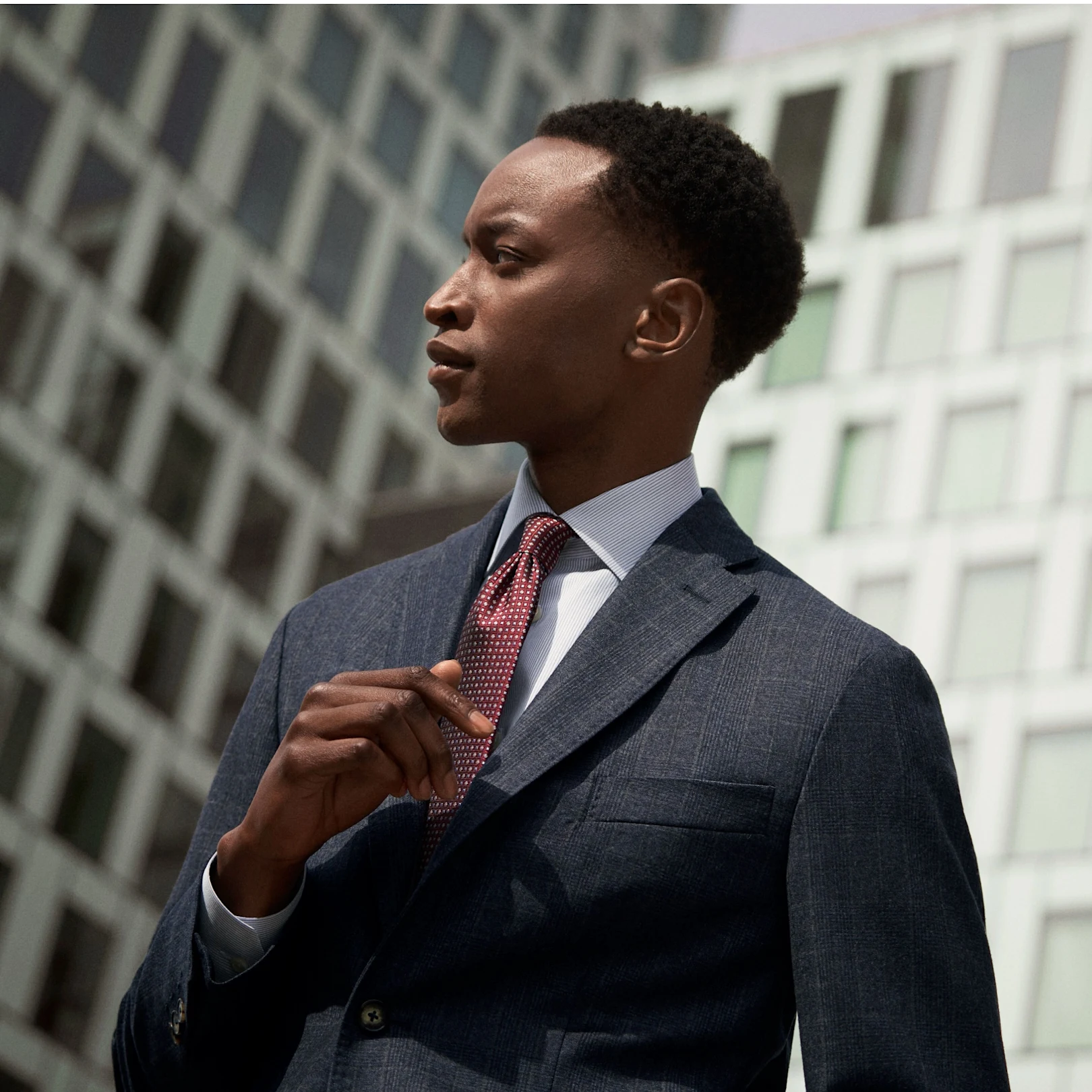 model in suit shirt and tie