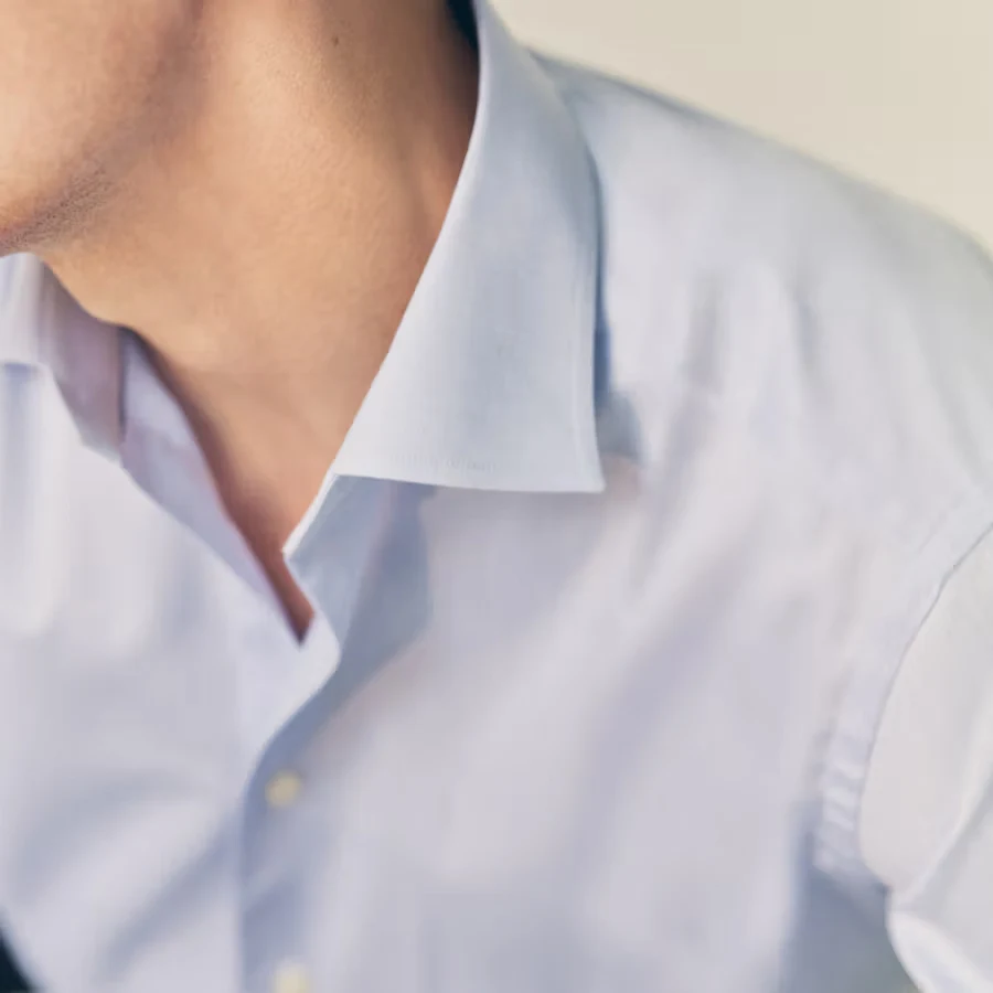white shirt with cut-away collar