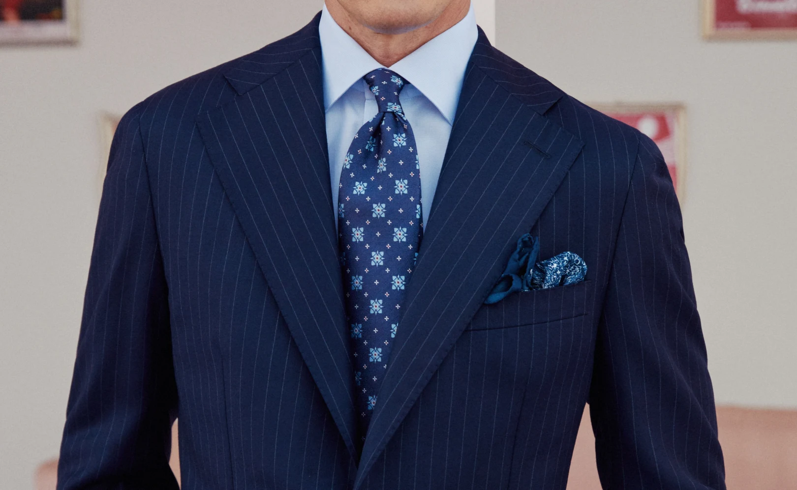 blue pocket square in suit matching tie
