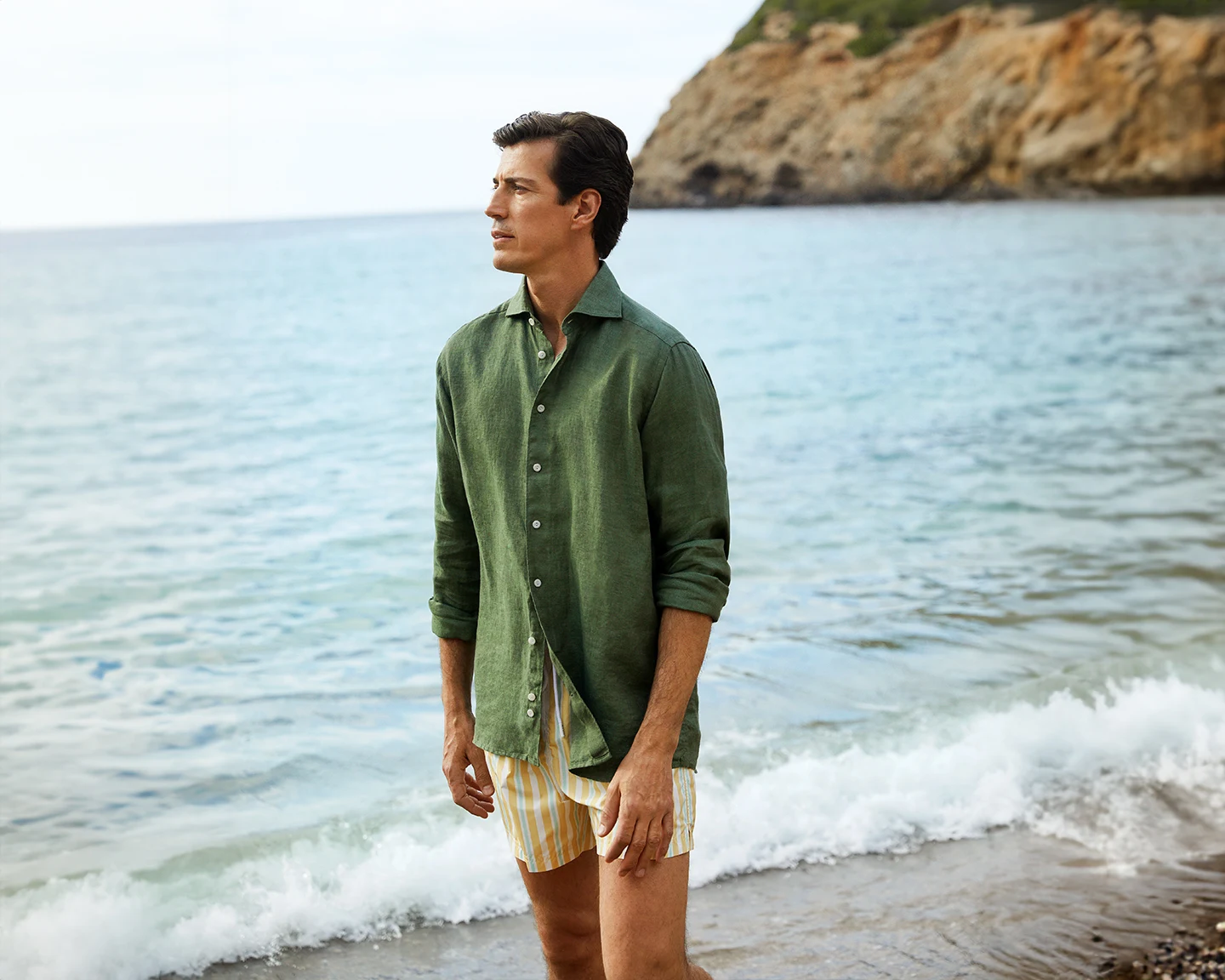 model in green linen shirt